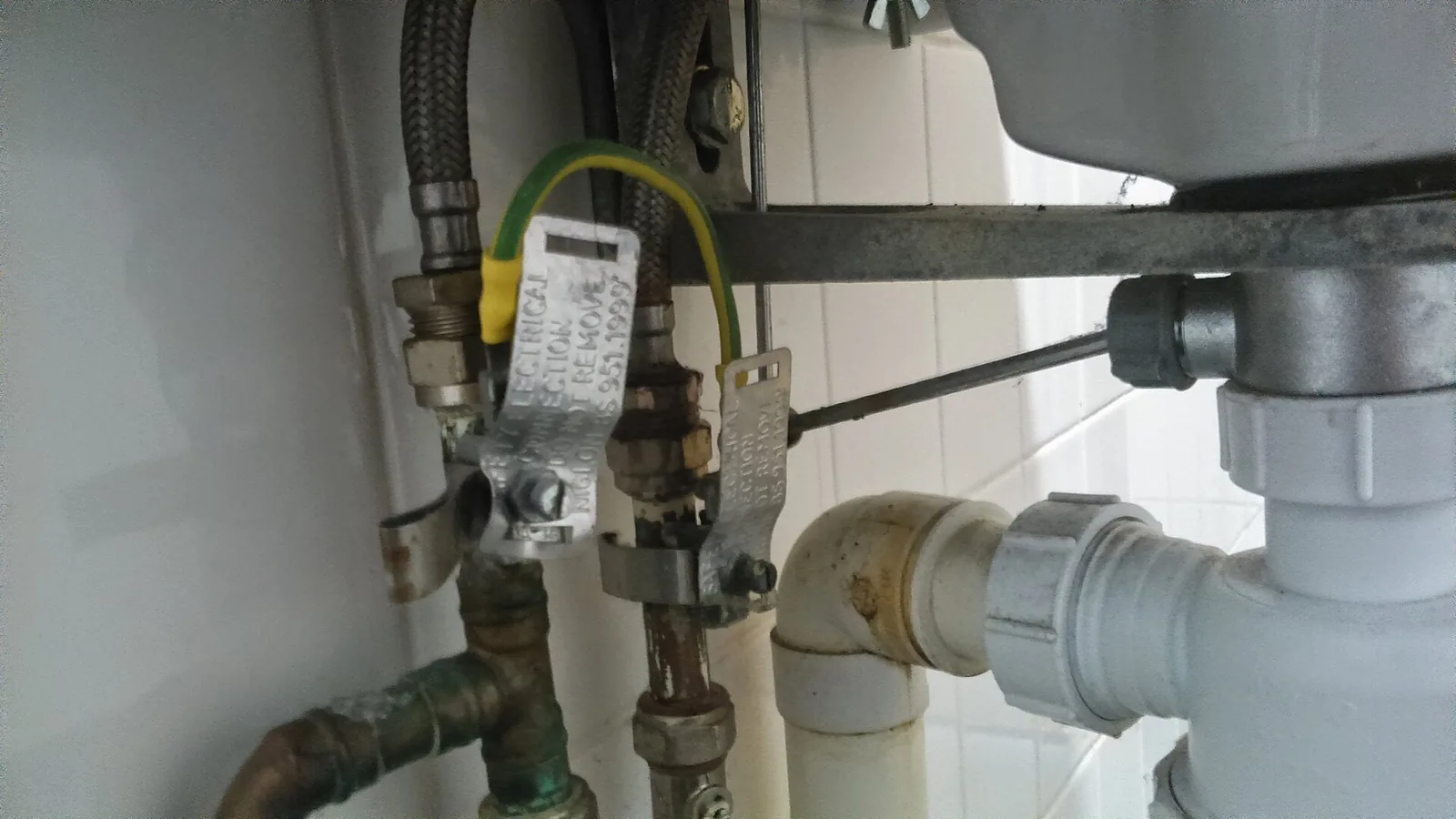 Copper pipework under a sink