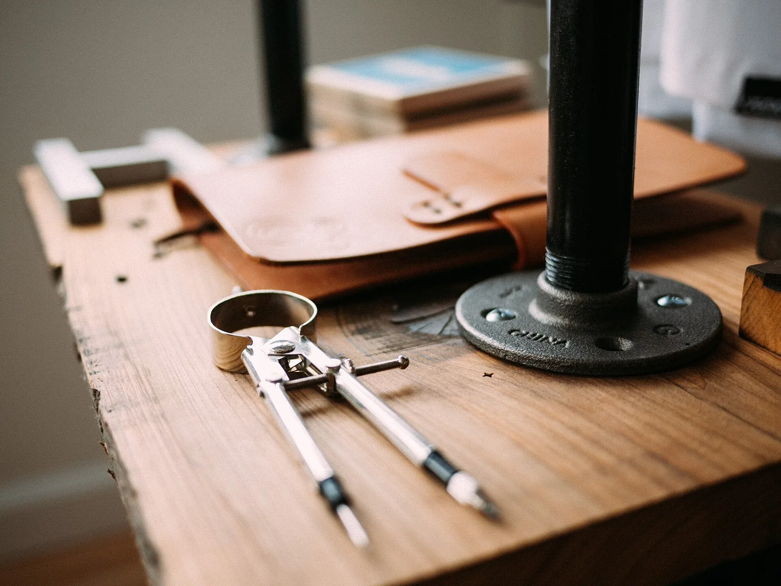 Plumbing tools laid out on a bench